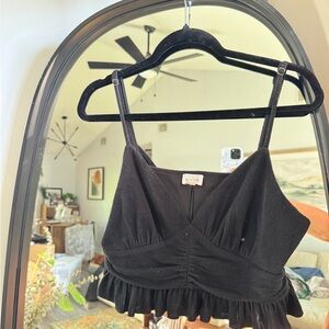 Le Lis black going out top